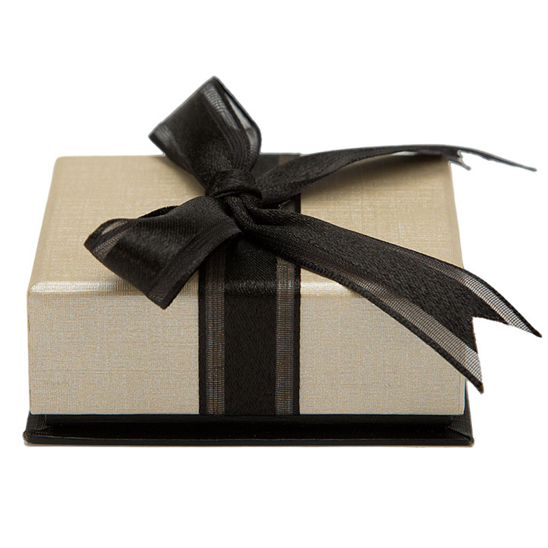Textured Gift Box with a Black Ribbon Bow